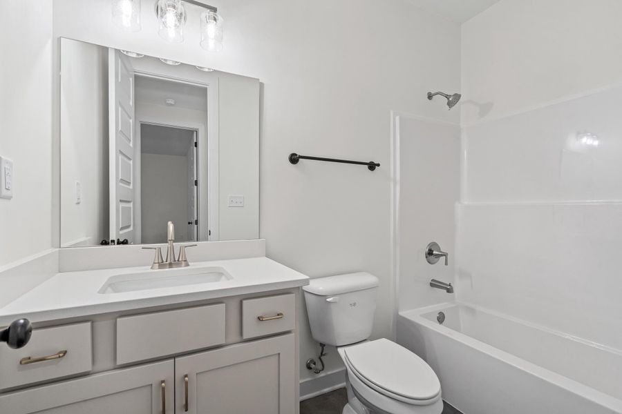 Furnished interior view inside a new home in Walker Farms, Bartlett (Image 12).