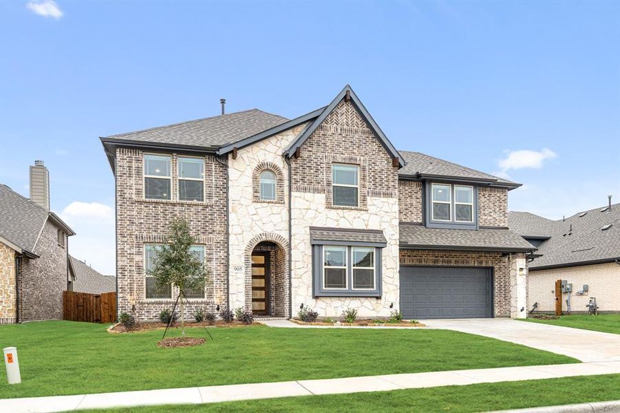 Front exterior of a new home in West Crossing, Anna, TX, highlighting curb appeal (Image 26). Front exterior of a new home in West Crossing, Anna, TX, highlighting curb appeal (Image 26).