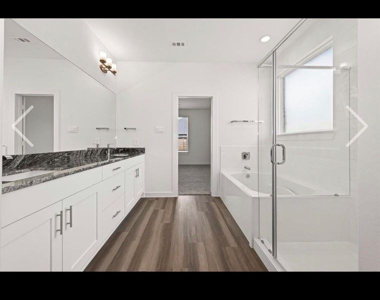 Furnished interior view inside a new home in Harvest Green, Richmond (Image 6).