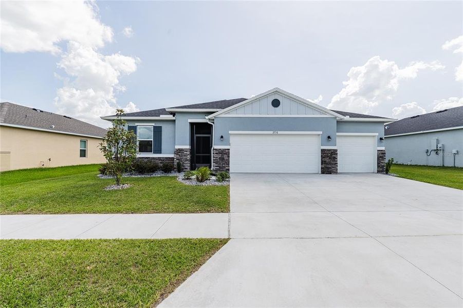 Front exterior of a new home in , Bartow, FL, highlighting curb appeal (Image 20).