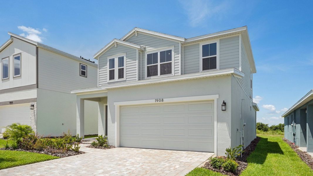 Representative exterior photo of a completed home built from the Jupiter by DRB Homes in Hamilton Bluff, Haines City, FL (Image 21).