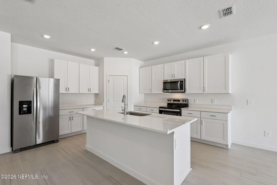 Furnished interior view inside a new home in Cypress Meadows - Signature Series, Jacksonville (Image 14).
