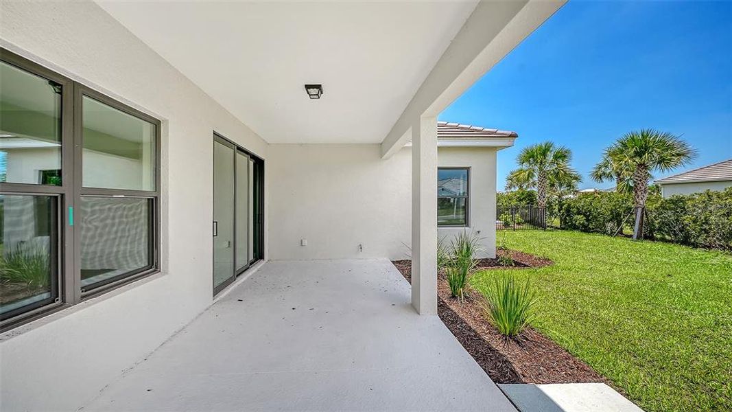 Exterior details and patio area of a home in Grand Park, Sarasota (Image 24). Exterior details and patio area of a home in Grand Park, Sarasota (Image 24).