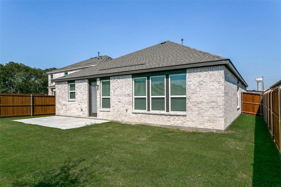 Exterior details and patio area of a home in The Preserve, Justin (Image 4). Exterior details and patio area of a home in The Preserve, Justin (Image 4).