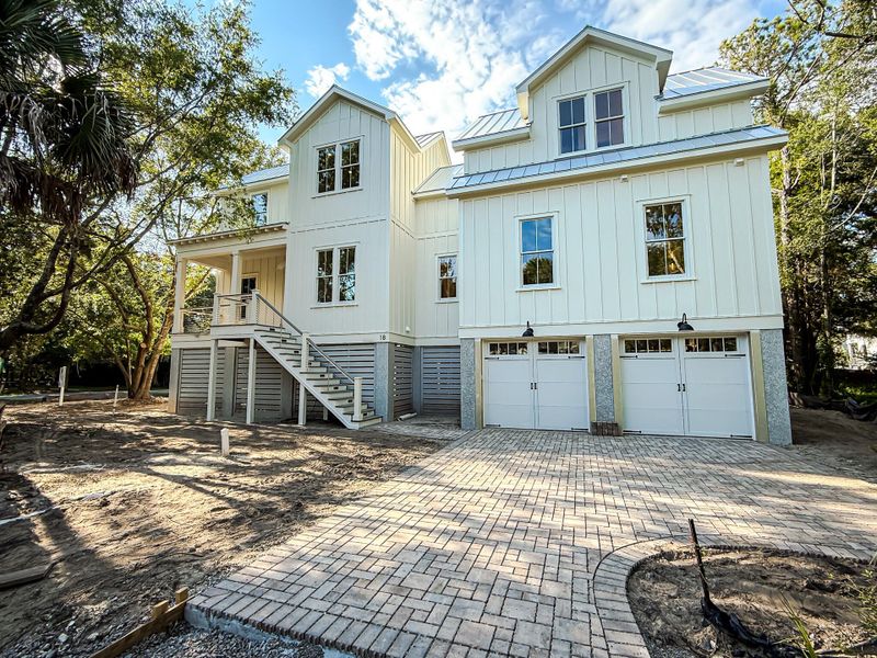Front exterior of a new home in , Isle Of Palms, SC, highlighting curb appeal (Image 32). Front exterior of a new home in , Isle Of Palms, SC, highlighting curb appeal (Image 32).