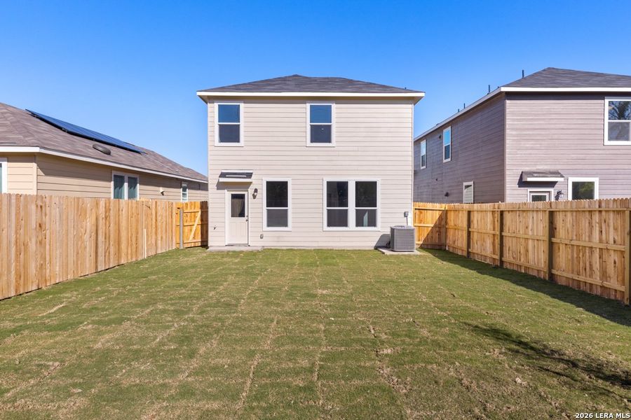 Exterior details and patio area of a home in Spanish Trails Villas, San Antonio (Image 4).