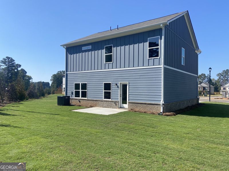 Exterior details and patio area of a home in Trellis Park, Hampton (Image 3).