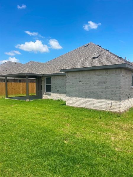Exterior details and patio area of a home in , Springtown (Image 4).