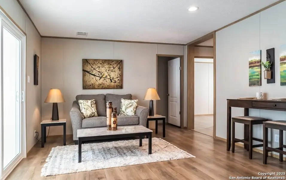 Furnished interior view inside a new home in , Elmendorf (Image 7).