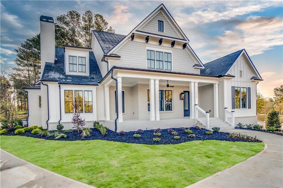 Front exterior of a new home in , Woodstock, GA, highlighting curb appeal (Image 2).