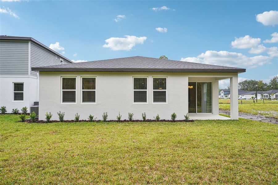 Exterior details and patio area of a home in Ridgehaven - Signature Series, Ormond Beach (Image 27).