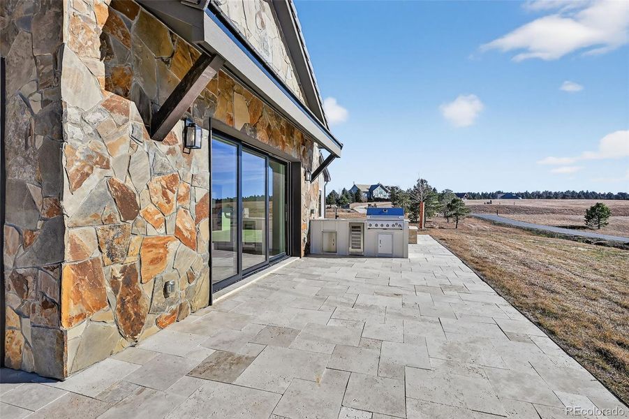 Wrap patio off Dining Room. Outdoor Kitchen and Firepit (beyond).