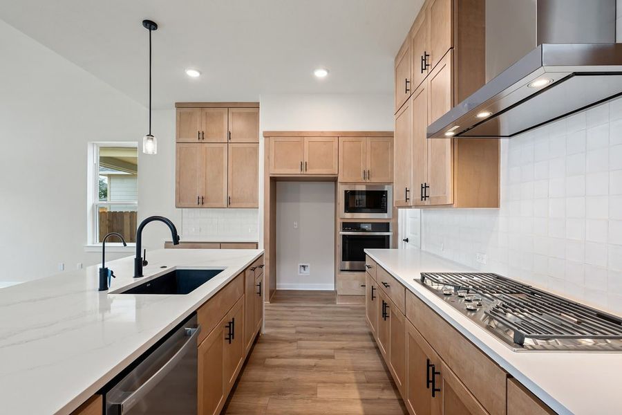 Furnished interior view inside a new home in Heritage, Dripping Springs (Image 9).