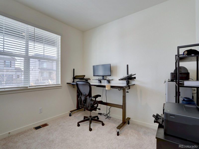 Furnished interior view inside a new home in Crystal Valley Pine Ridge, Castle Rock (Image 20).