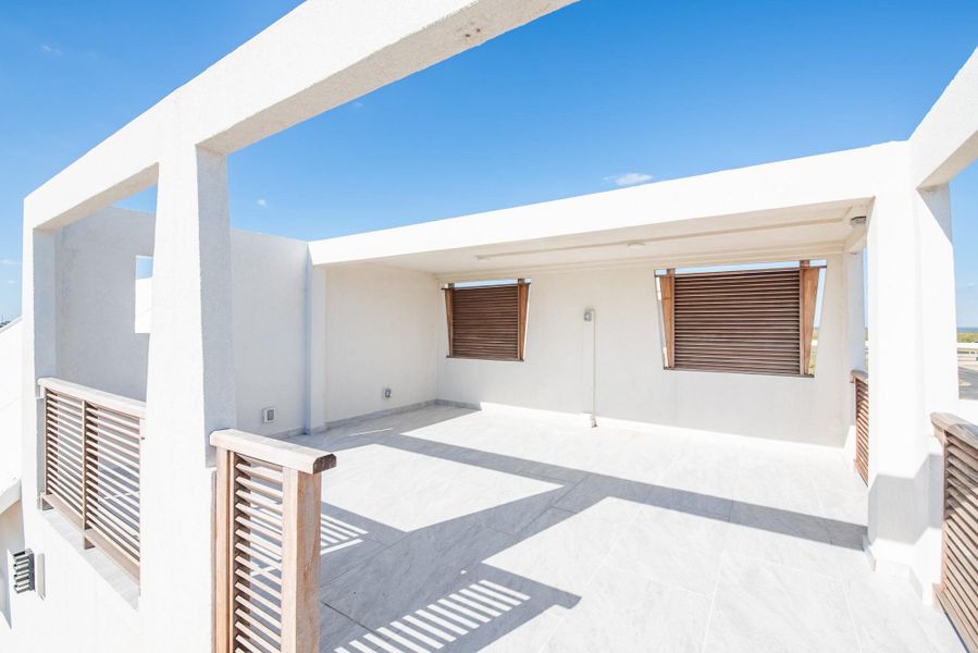 Exterior details and patio area of a home in , Port Aransas (Image 4).