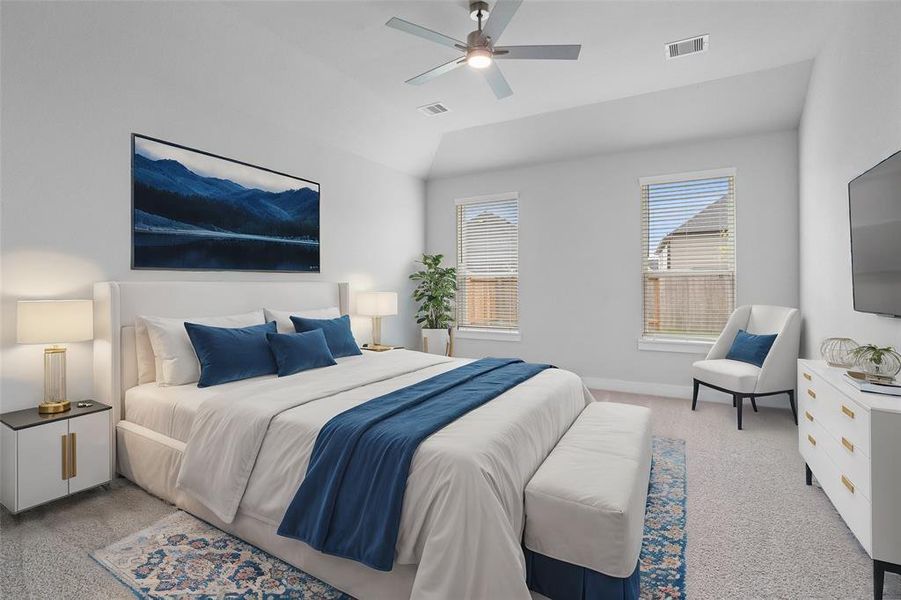 Come and unwind after a long day in this magnificent primary suite! This spacious room features plush carpet, warm paint, high ceilings, ceiling fan and large windows with privacy blinds.