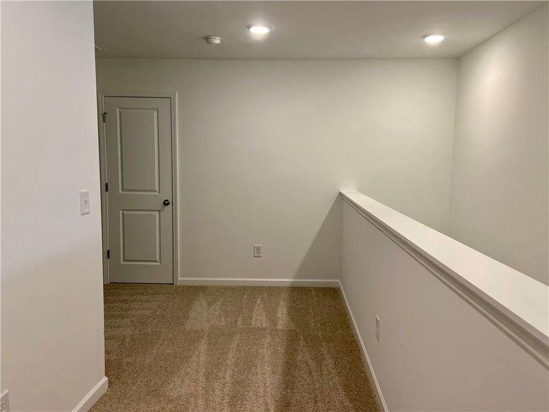 Spacious, unfurnished interior of a new home in Eastlyn Crossing, Flowery Branch (Image 15).