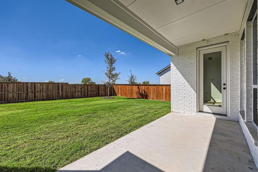 View of yard with a patio area