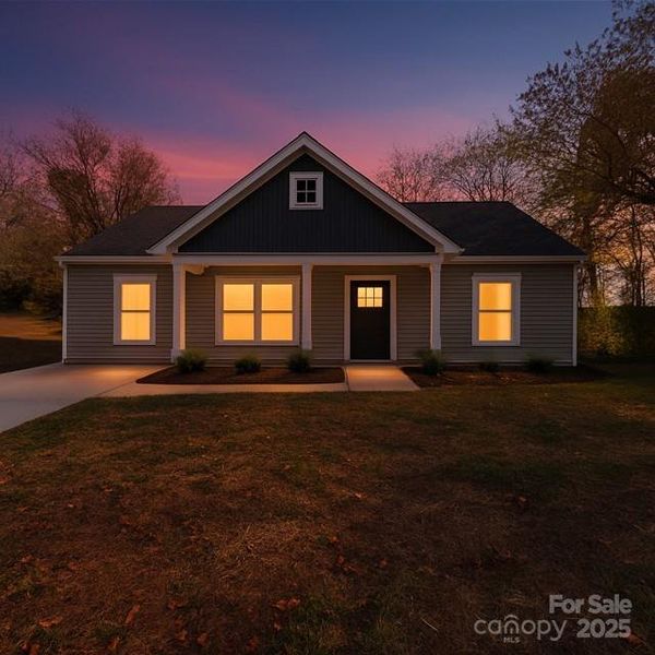 Front exterior of a new home in , Gastonia, NC, highlighting curb appeal (Image 21).
