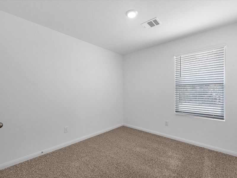 Spacious, unfurnished interior of a new home in William Trails, Willis (Image 23).