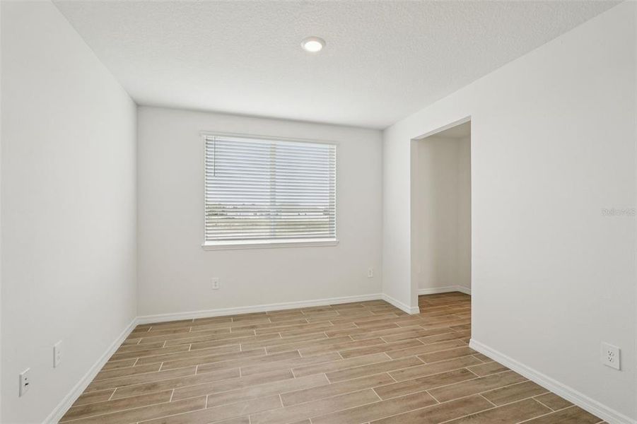 Spacious, unfurnished interior of a new home in Oakfield Trails - Signature Series, Parrish (Image 36).