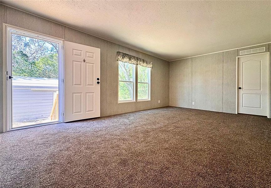 Spacious, unfurnished interior of a new home in , Brooksville (Image 6).