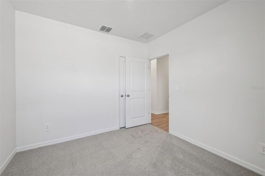 Spacious, unfurnished interior of a new home in Ridgehaven - Villas, Ormond Beach (Image 18).