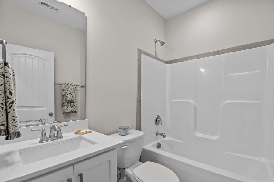 Representative furnished interior of a home built from the Garland by Caviness & Cates Communities in Bartlett Manor, Youngsville (Image 245). Representative furnished interior of a home built from the Garland by Caviness & Cates Communities in Bartlett Manor, Youngsville (Image 245).