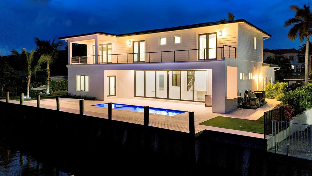 Front exterior of a new home in , Delray Beach, FL, highlighting curb appeal (Image 24).