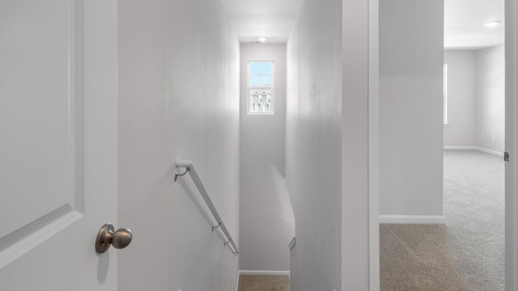 Spacious, unfurnished interior of a new home in The Landing at Sidbury Station, Castle Hayne (Image 22).