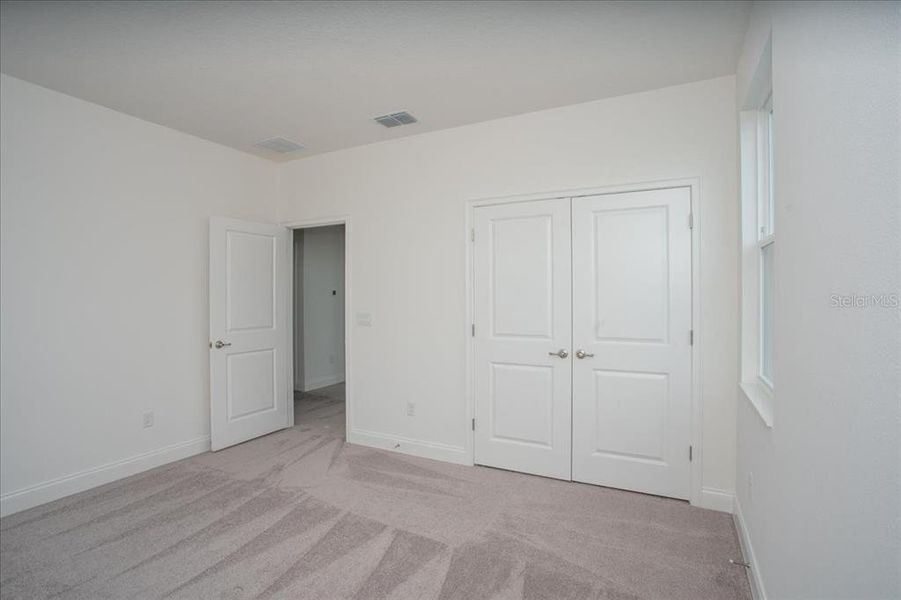 Spacious, unfurnished interior of a new home in Tamarack at Two Rivers, Zephyrhills (Image 13).