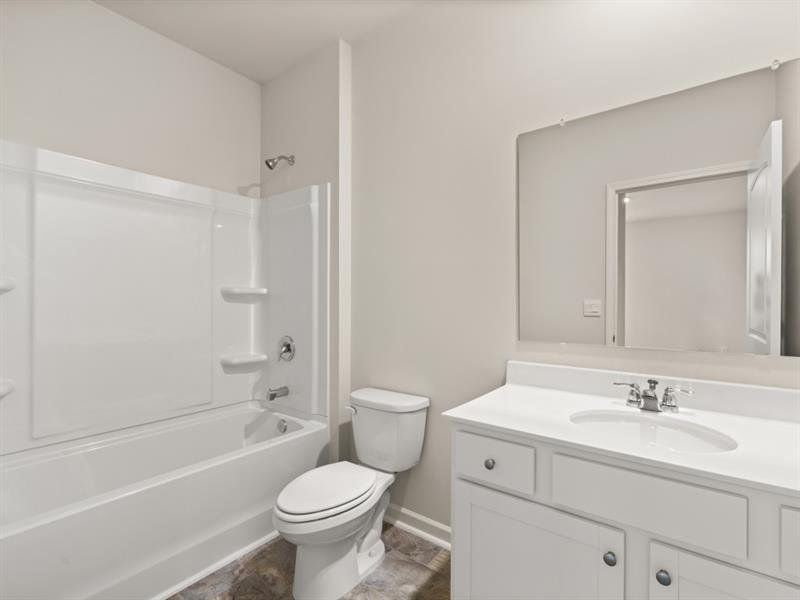 Furnished interior view inside a new home in Northwoods at Mirror Lake, Villa Rica (Image 9).