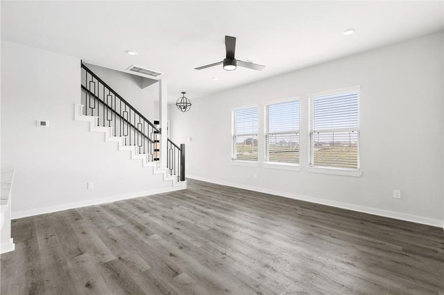 Family room with lots of lighting.