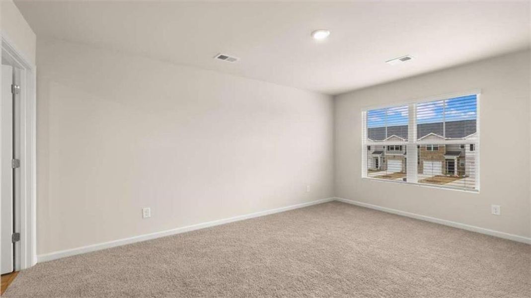 Spacious, unfurnished interior of a new home in Young's Crossing, Stone Mountain (Image 15).