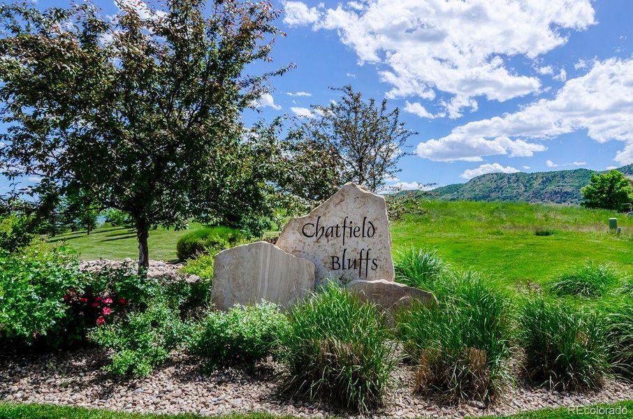 Front exterior of a new home in Chatfield Bluffs, Littleton, CO, highlighting curb appeal (Image 20).