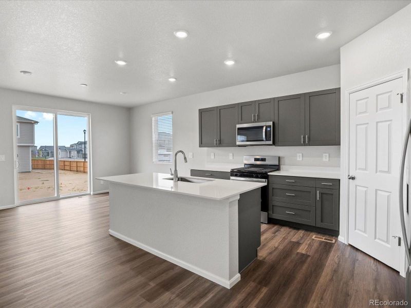 Furnished interior view inside a new home in Ridgeline Vista: The Flora Collection, Brighton (Image 17). Furnished interior view inside a new home in Ridgeline Vista: The Flora Collection, Brighton (Image 17).