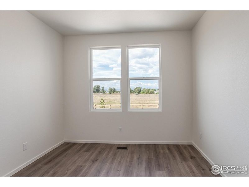 Spacious, unfurnished interior of a new home in Trailside Story Collection - Single Family Homes, Timnath (Image 21).