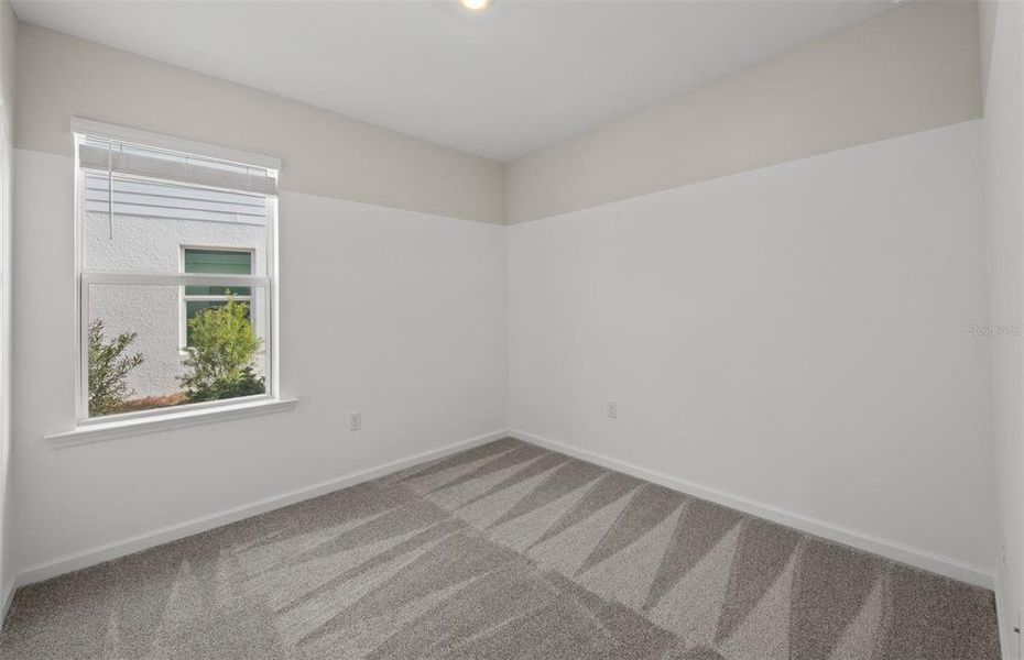 Spacious, unfurnished interior of a new home in Reagan Landing, Bradenton (Image 16).