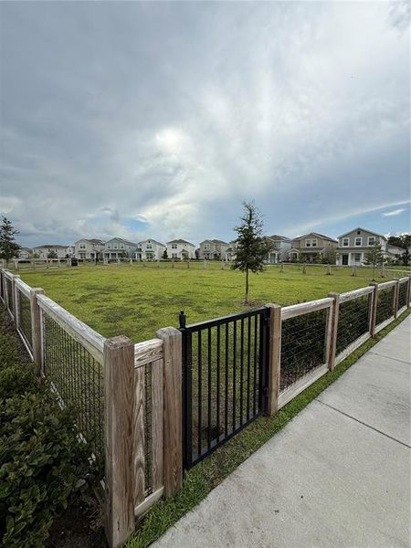 Front exterior of a new home in , Orlando, FL, highlighting curb appeal (Image 19). Front exterior of a new home in , Orlando, FL, highlighting curb appeal (Image 19).