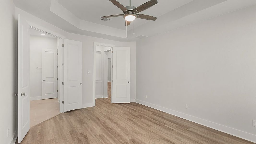 Representative unfurnished interior of a home built from the Brenner by Chesmar Homes in Newhaven, Manor (Image 39).