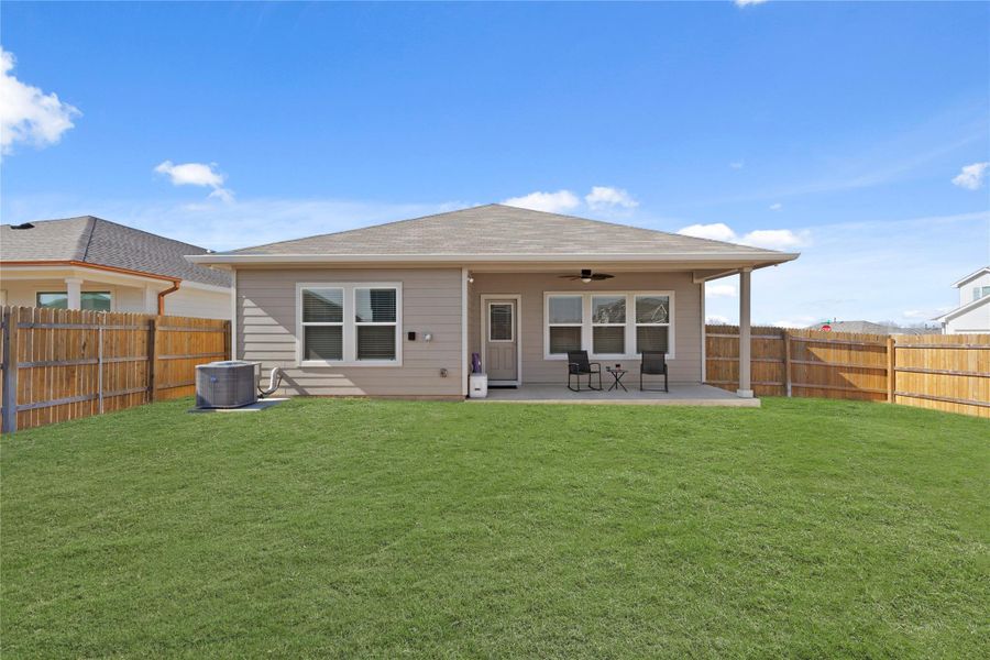 Space to run and play! With its sprawling green lawn and open sky views, this oversized lot offers endless possibilities for gardening, outdoor games, or building your dream backyard retreat.