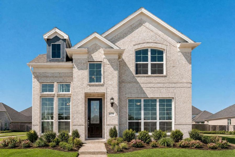 Representative exterior photo of a completed home built from the Royal Evelyn by Grand Homes in Edgewater, Fate, TX (Image 1). Representative exterior photo of a completed home built from the Royal Evelyn by Grand Homes in Edgewater, Fate, TX (Image 1).