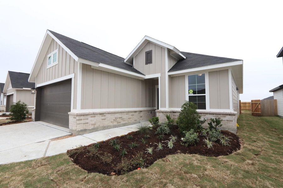 Front exterior of a new home in , Cypress, TX, highlighting curb appeal (Image 8).