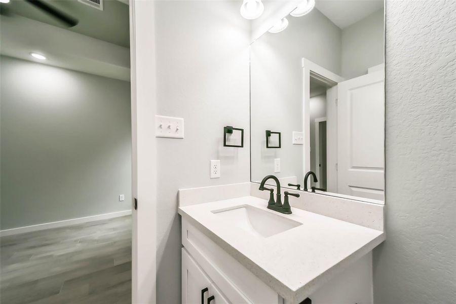 Furnished interior view inside a new home in , Conroe (Image 14).