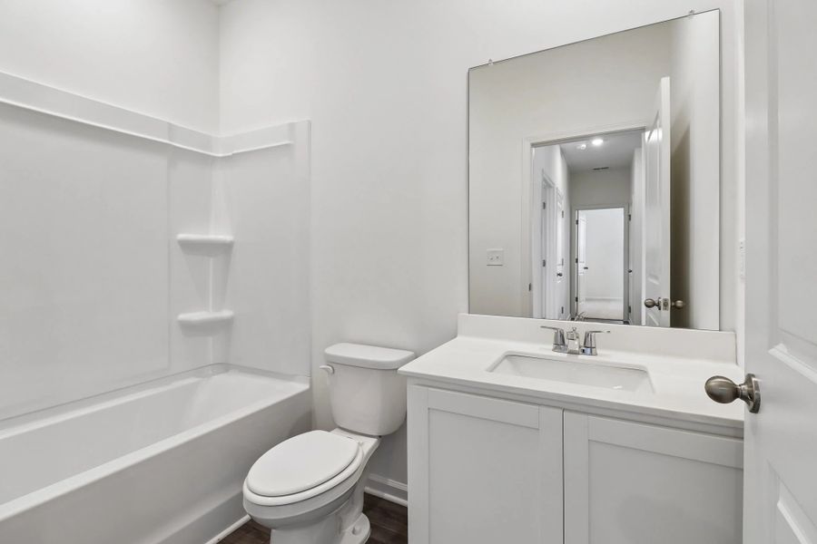 Representative furnished interior of a home built from the Larissa by Starlight Homes in Crescent Pointe, Carrollton (Image 13).