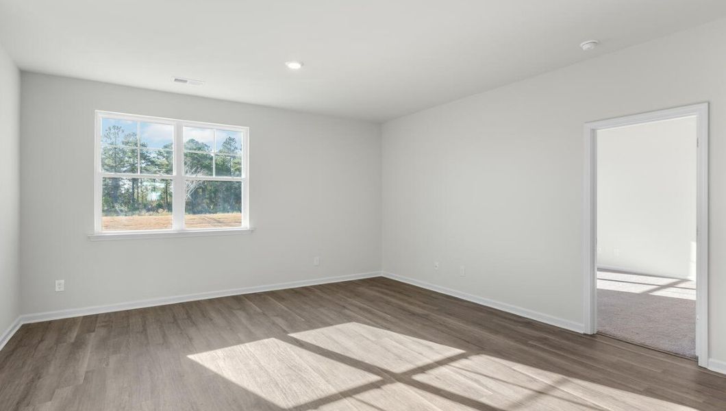 Representative unfurnished interior of a home built from the Kerry by D.R. Horton in Cedar Hill Landing, Navassa (Image 16).