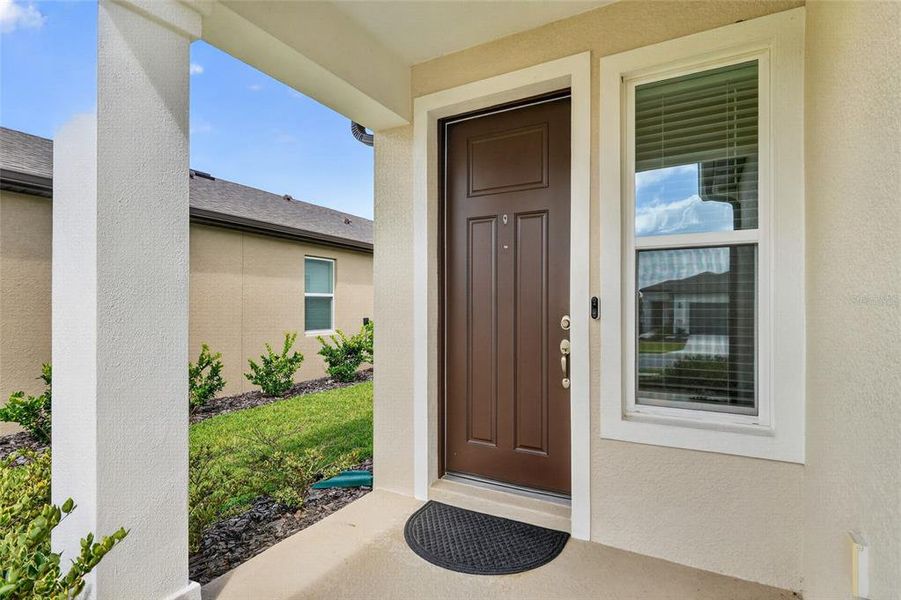 Exterior details and patio area of a home in Del Webb Stone Creek, Ocala (Image 3).