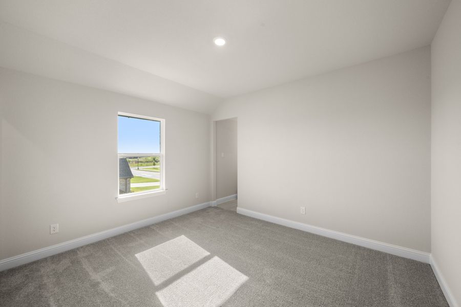 Spacious, unfurnished interior of a new home in Coyote Crossing, Godley (Image 22).