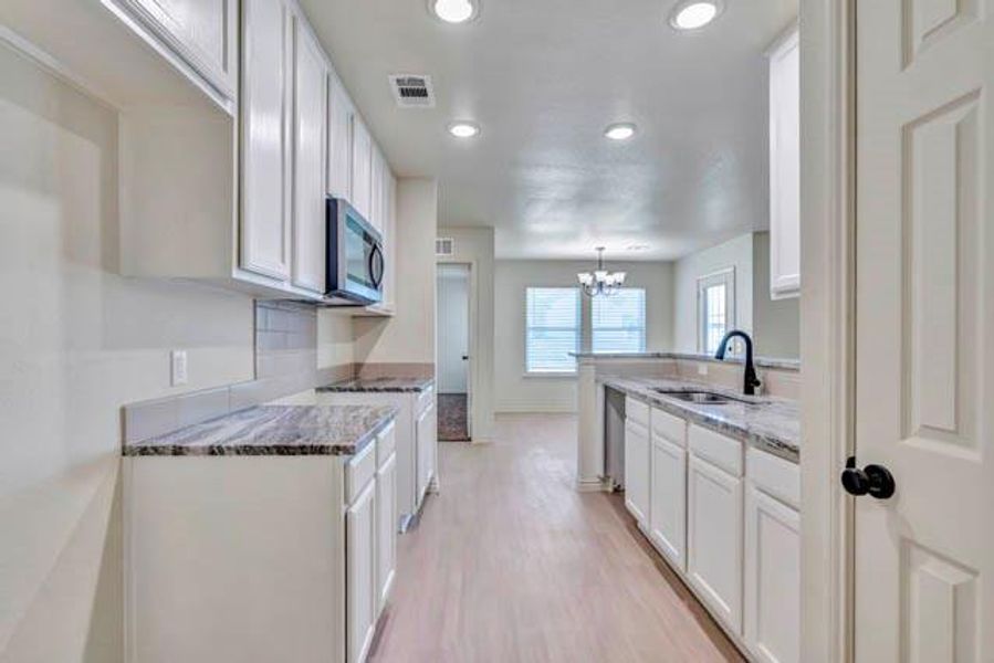 Furnished interior view inside a new home in , Fort Worth (Image 5).