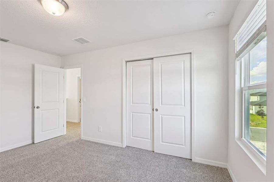 Spacious, unfurnished interior of a new home in Crosswinds - Signature Series, Haines City (Image 32).